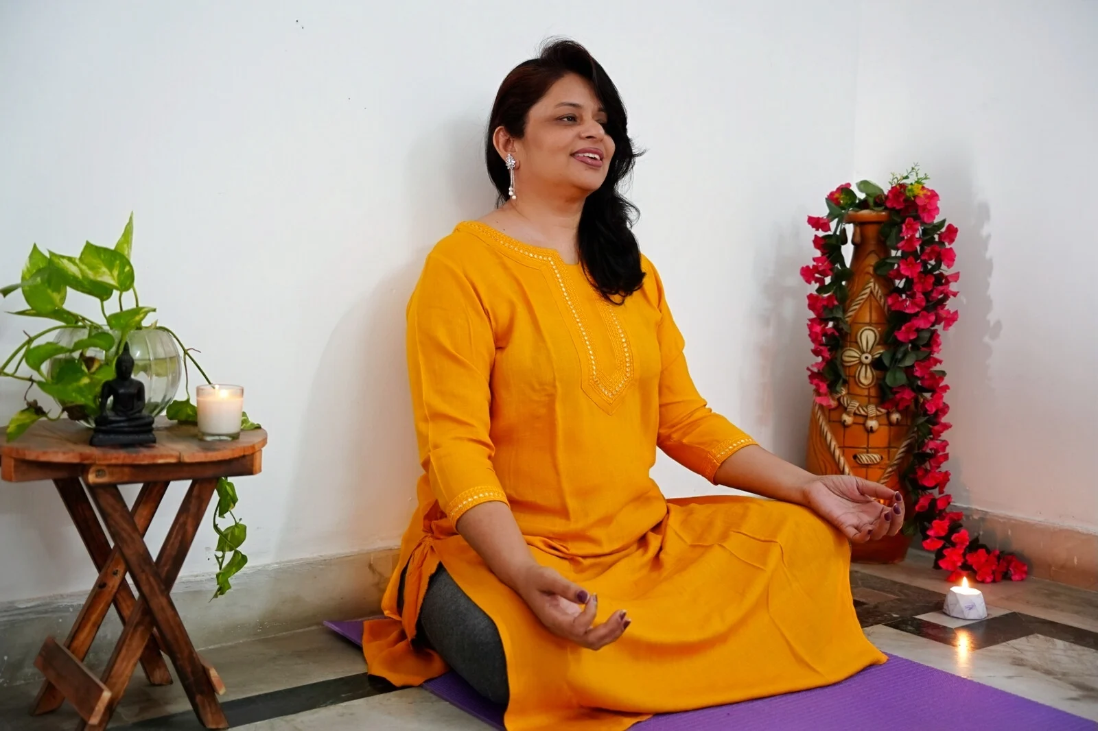 Swati Amrit seated in meditation in her practice room